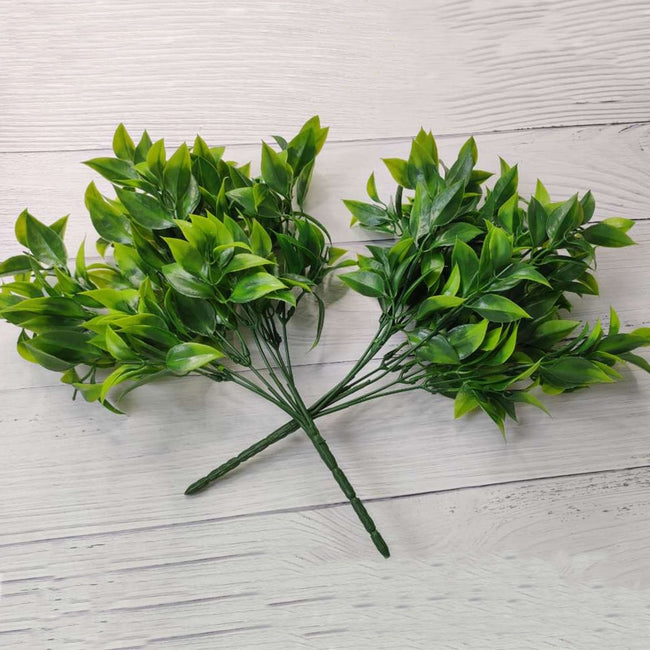 Green medium sized artificial plant 7 forks of foliage with approx. 35 leaves.